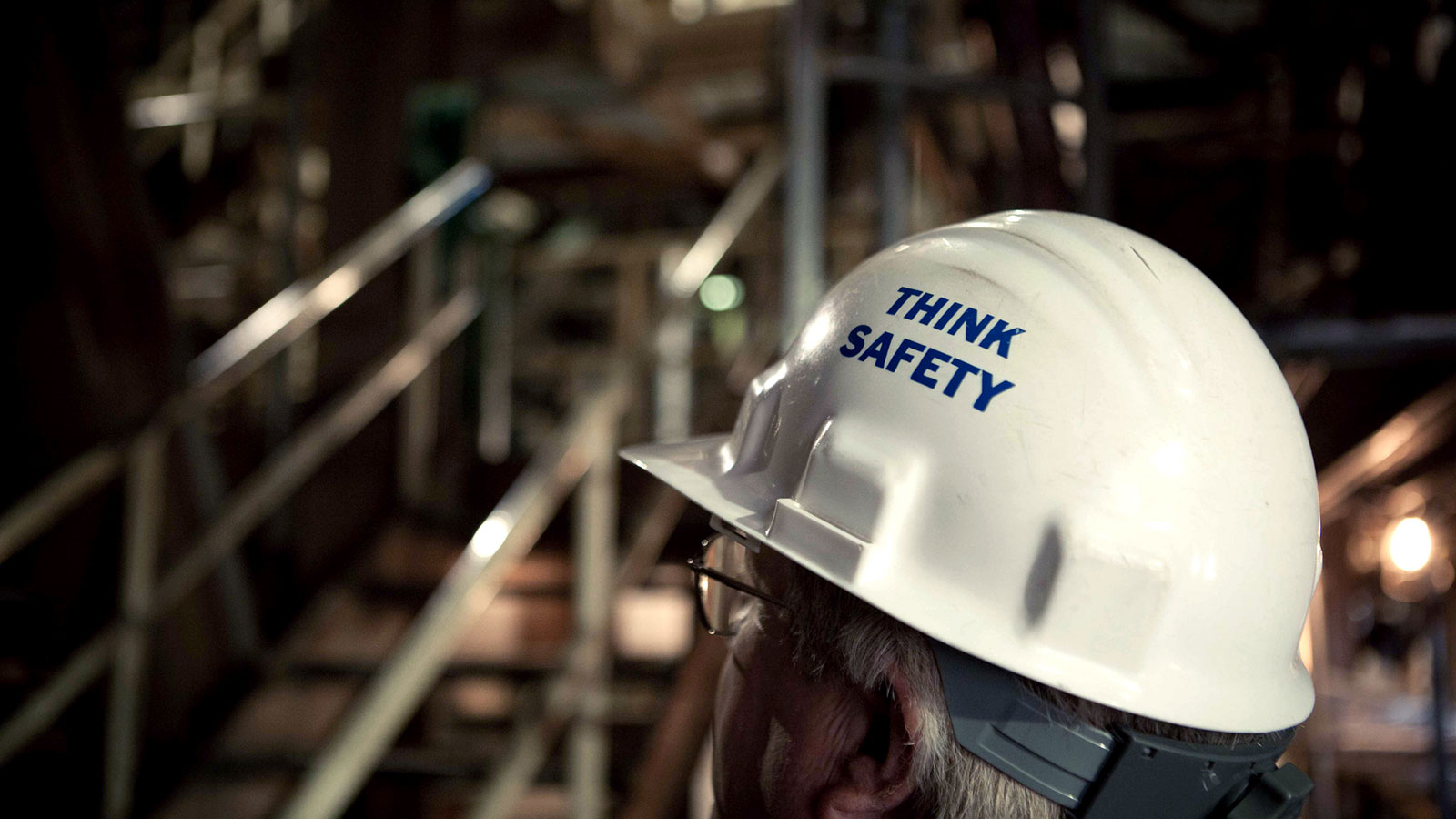 Think Safety Babcock Power employee wearing a hardhat that says 'Think Safety'